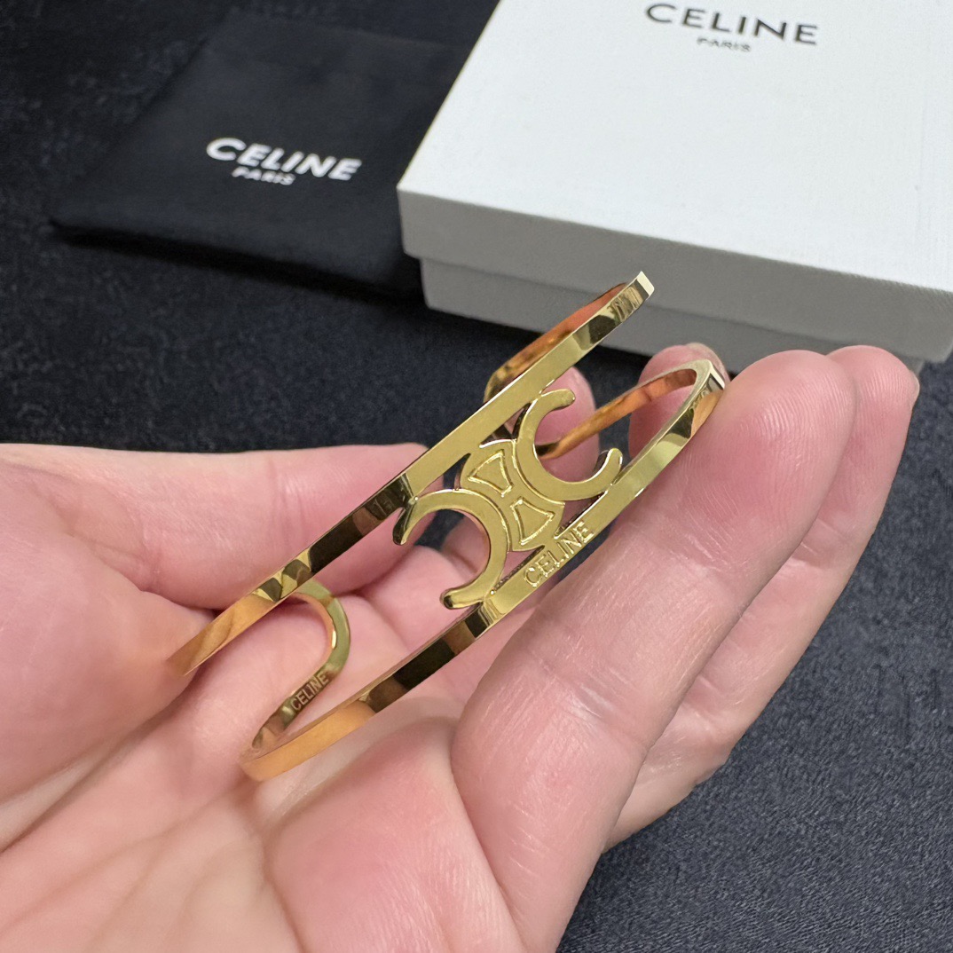 Celine Triomphe Skeleton Open Cuff bracelet gold-tone metal no additional stones adjustable open cuff fits 15-18cm wrist circumference