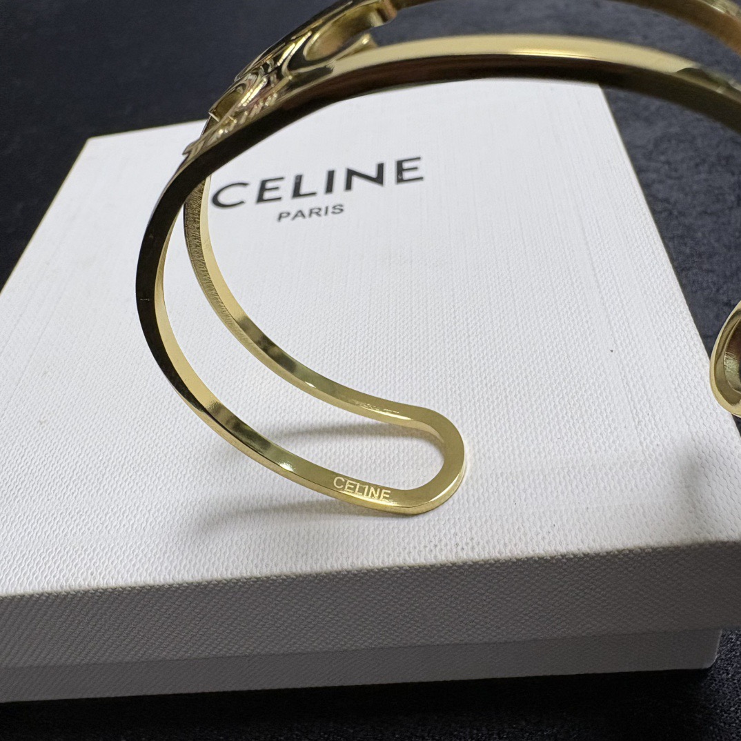 Celine Triomphe Skeleton Open Cuff bracelet gold-tone metal no additional stones adjustable open cuff fits 15-18cm wrist circumference
