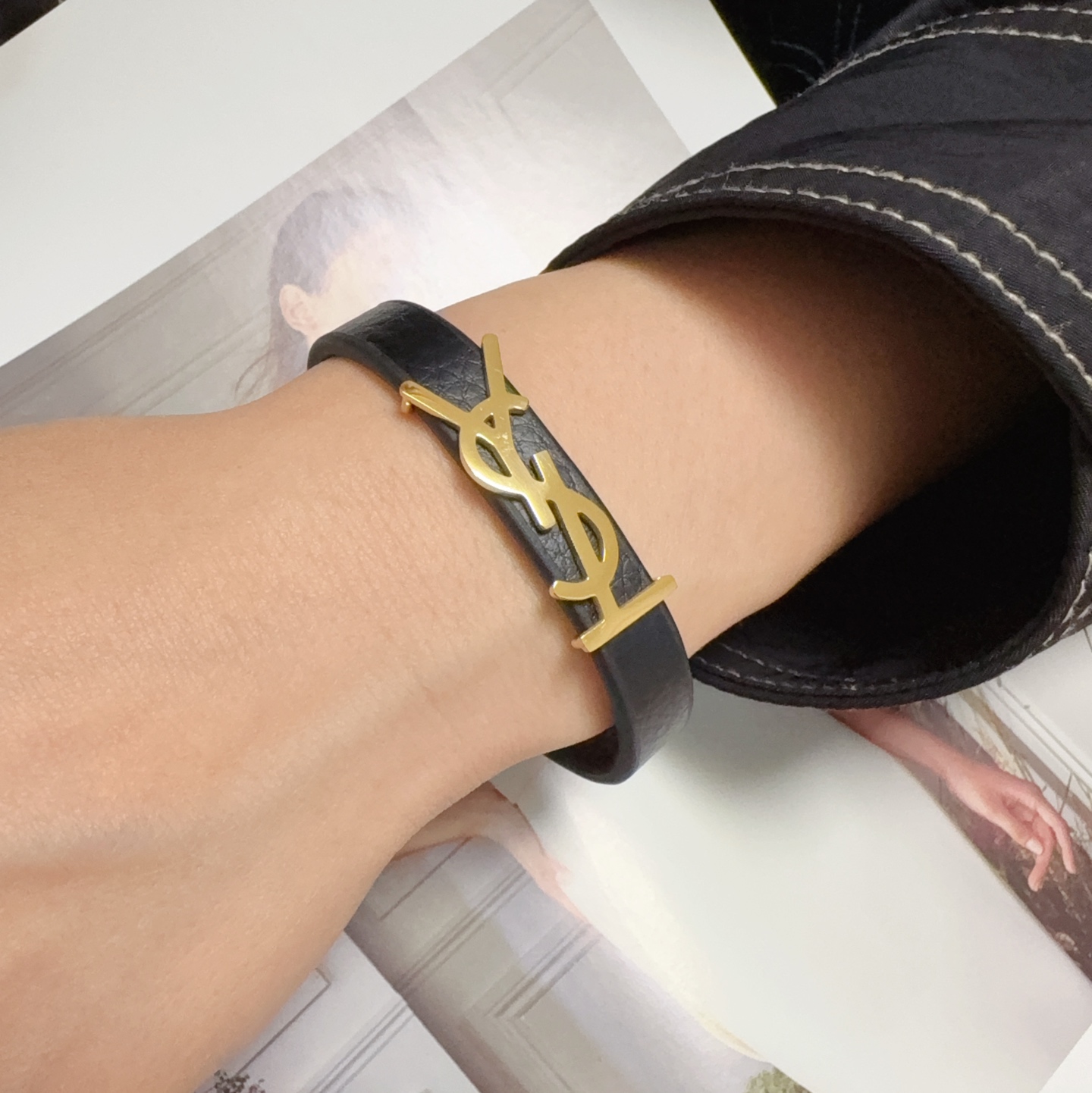 Saint Laurent Cassandre YSL Monogram Leather Bracelet bracelet Black grained leather with gold-tone metal hardware 19cm