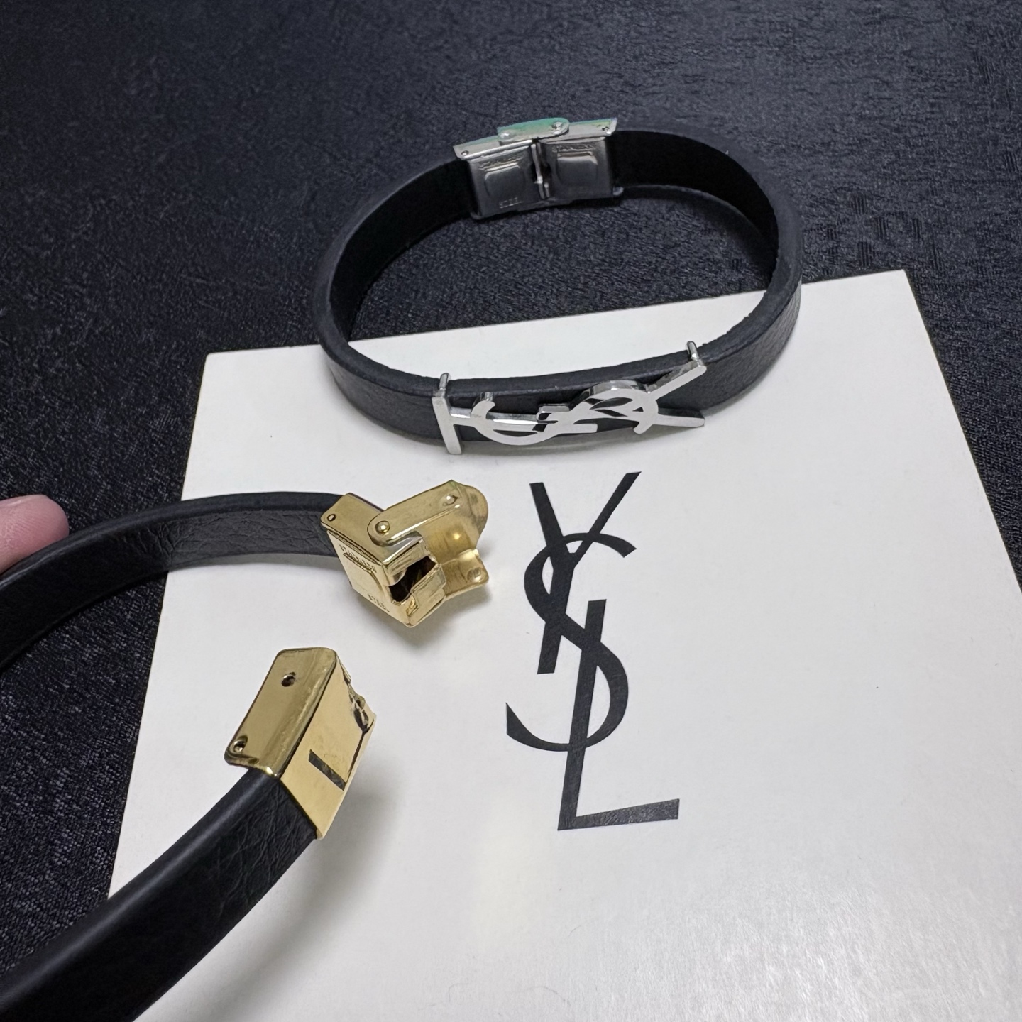 Saint Laurent Cassandre YSL Monogram Leather Bracelet bracelet Black grained leather with gold-tone metal hardware 19cm