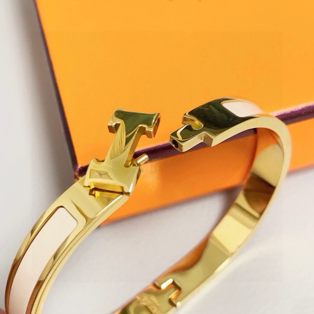 Bracciale Hermes Clic H in metallo color oro con smalto crema 8 mm MM