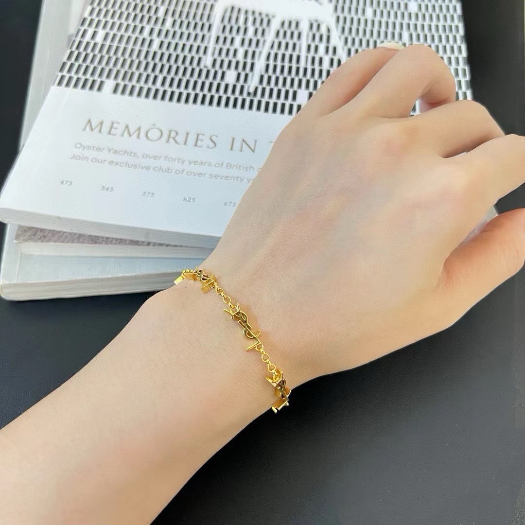 Saint Laurent Cassandre YSL Monogram Chain Bracelet bracelet gold-tone metal no accent stones 19cm with 3cm extender