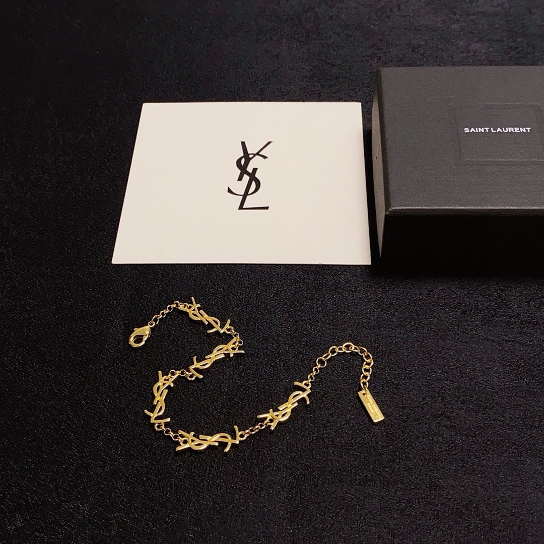 Saint Laurent Cassandre YSL Monogram Chain Bracelet bracelet gold-tone metal no accent stones 19cm with 3cm extender