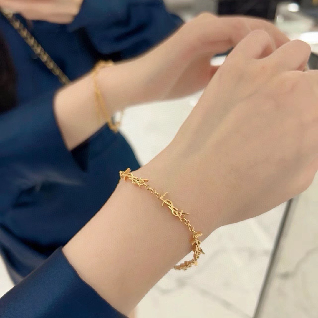Saint Laurent Cassandre YSL Monogram Chain Bracelet bracelet gold-tone metal no accent stones 19cm with 3cm extender