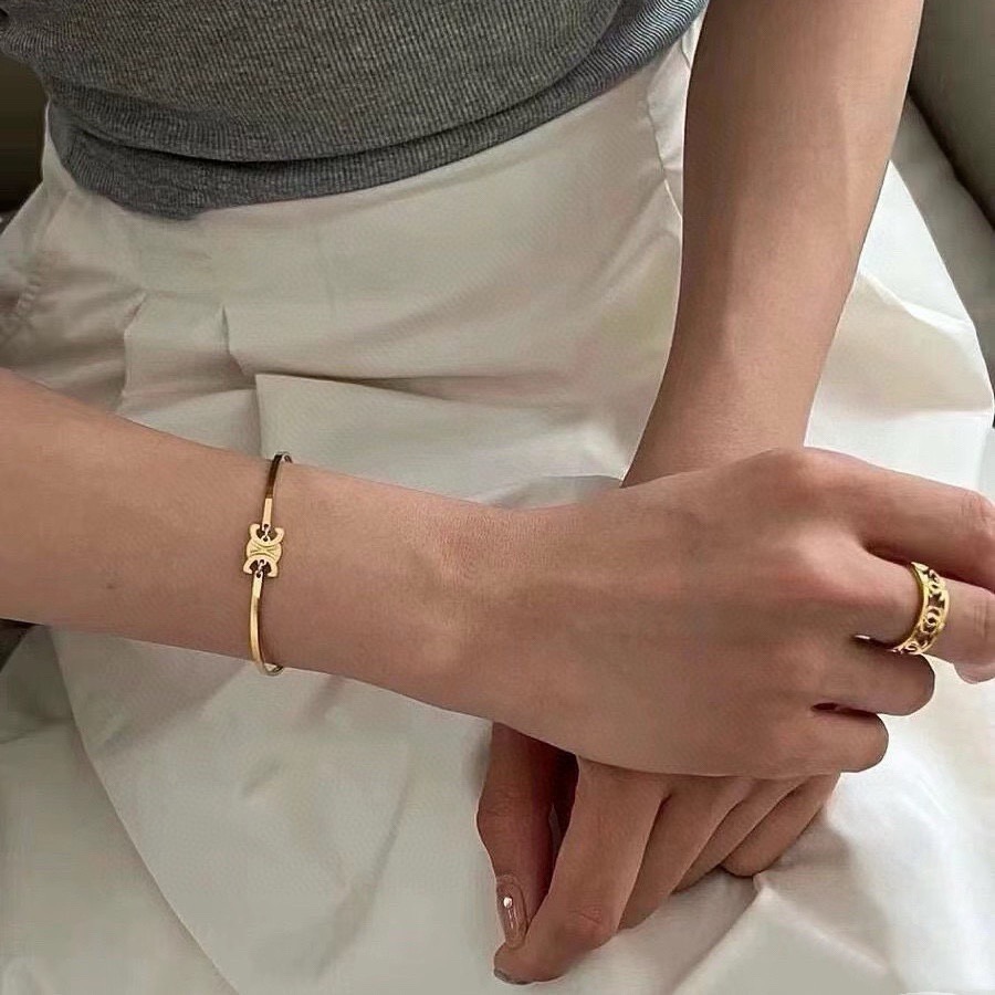 Celine Triomphe bracelet Silver-toned metal first variant Gold-toned metal second and third variants no gemstones 17cm