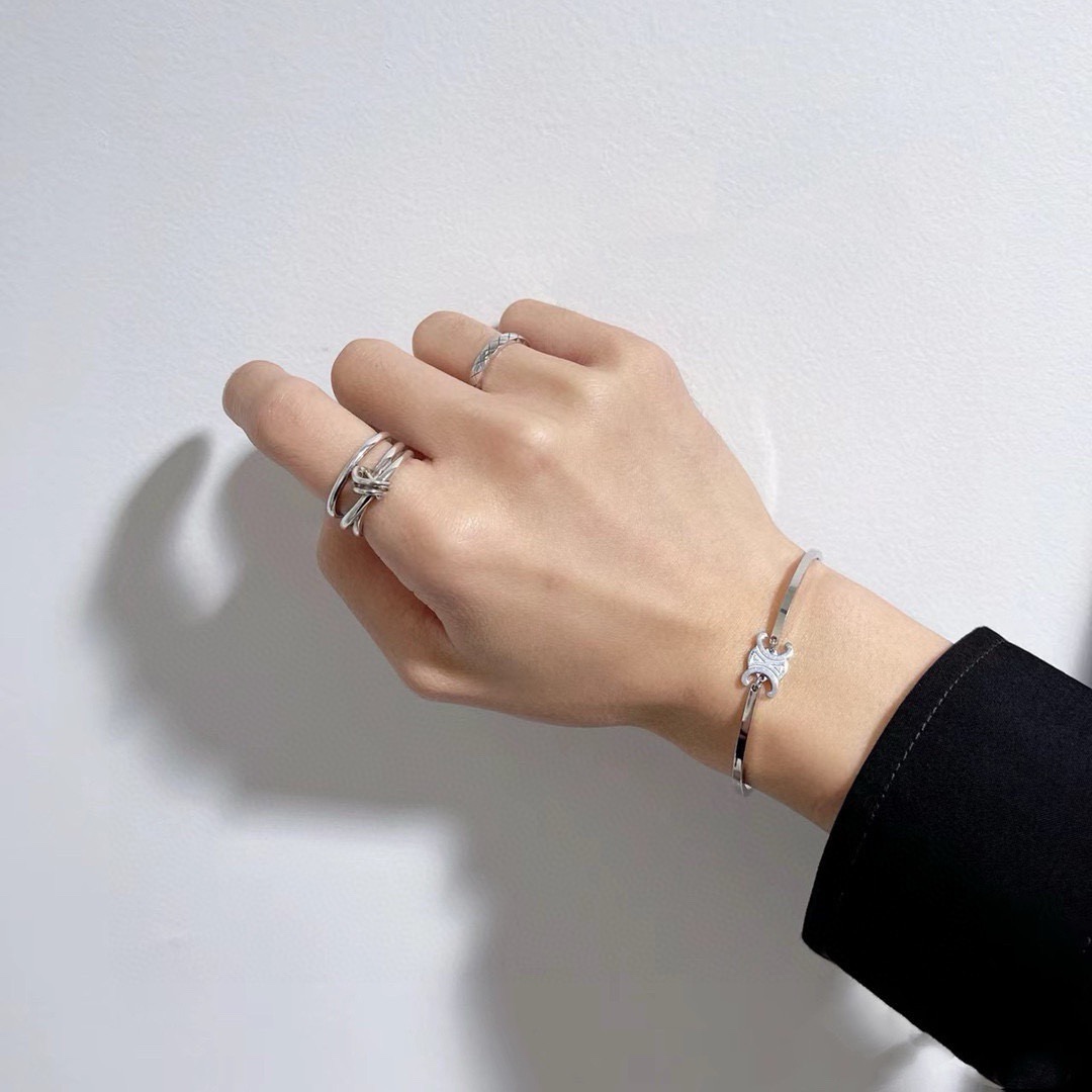 Celine Triomphe bracelet Silver-toned metal first variant Gold-toned metal second and third variants no gemstones 17cm