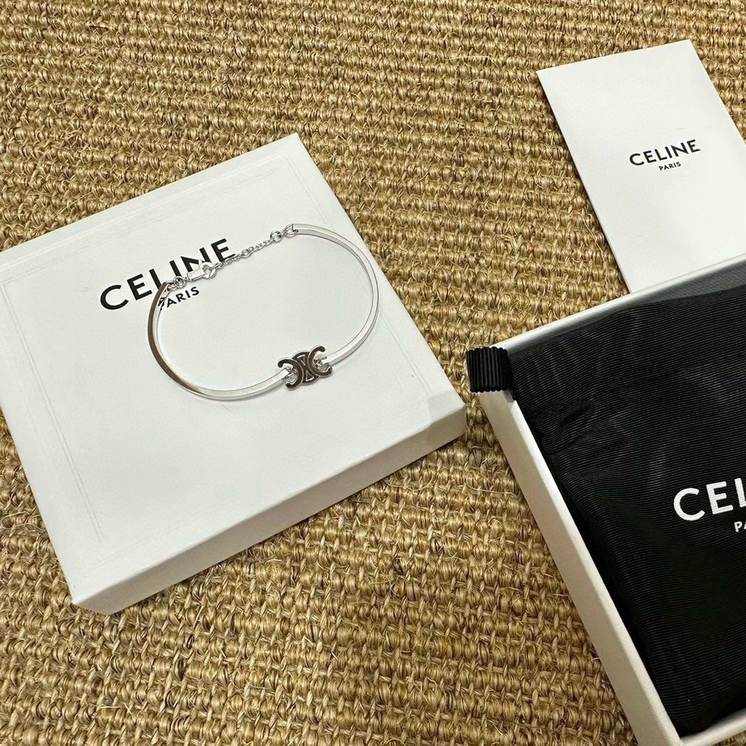 Celine Triomphe bracelet Silver-toned metal first variant Gold-toned metal second and third variants no gemstones 17cm