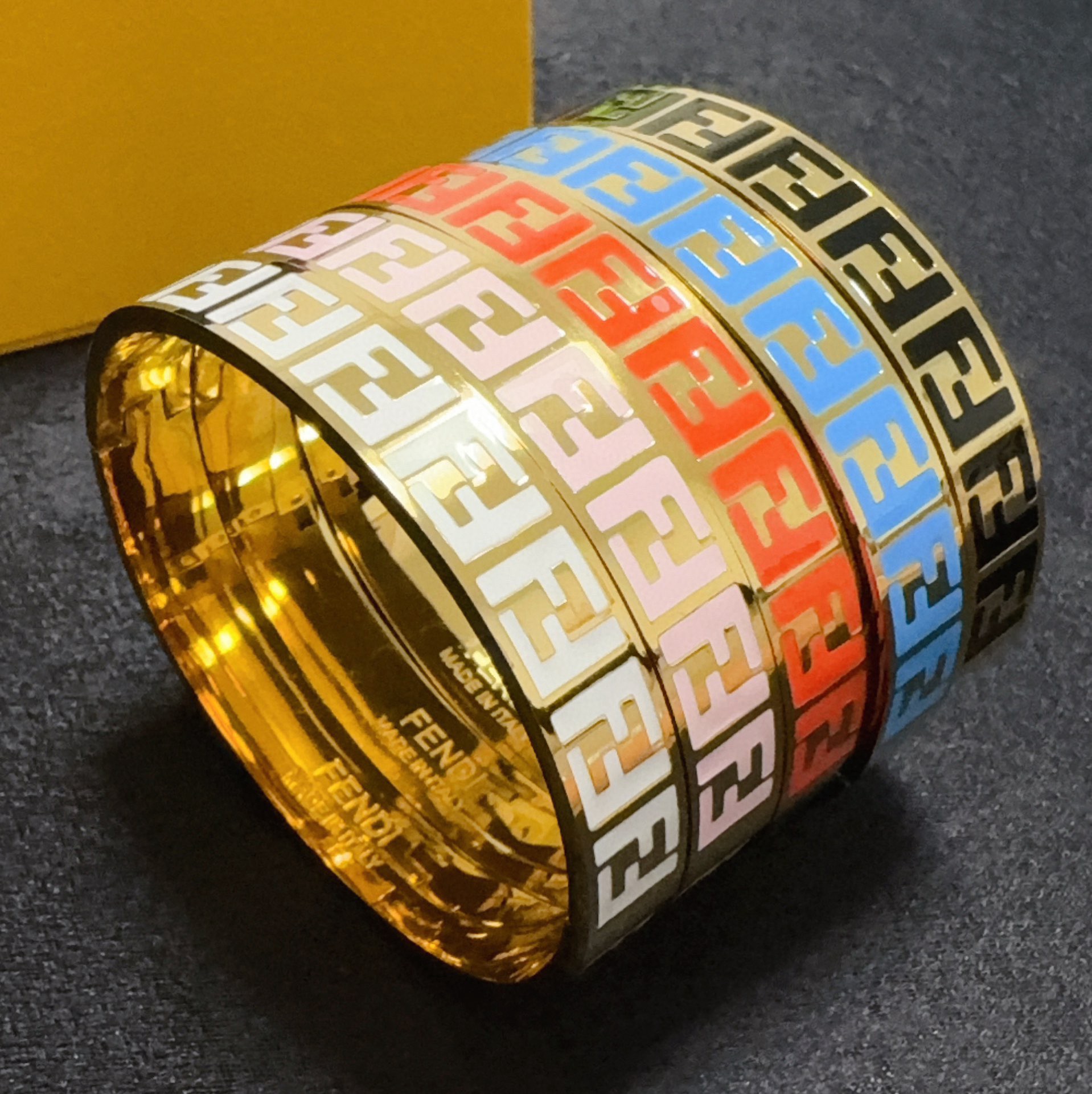 Fendi FF Logo Enamel Bangle bracelet gold-tone metal with black enamel FF monogram 17cm inner circumference