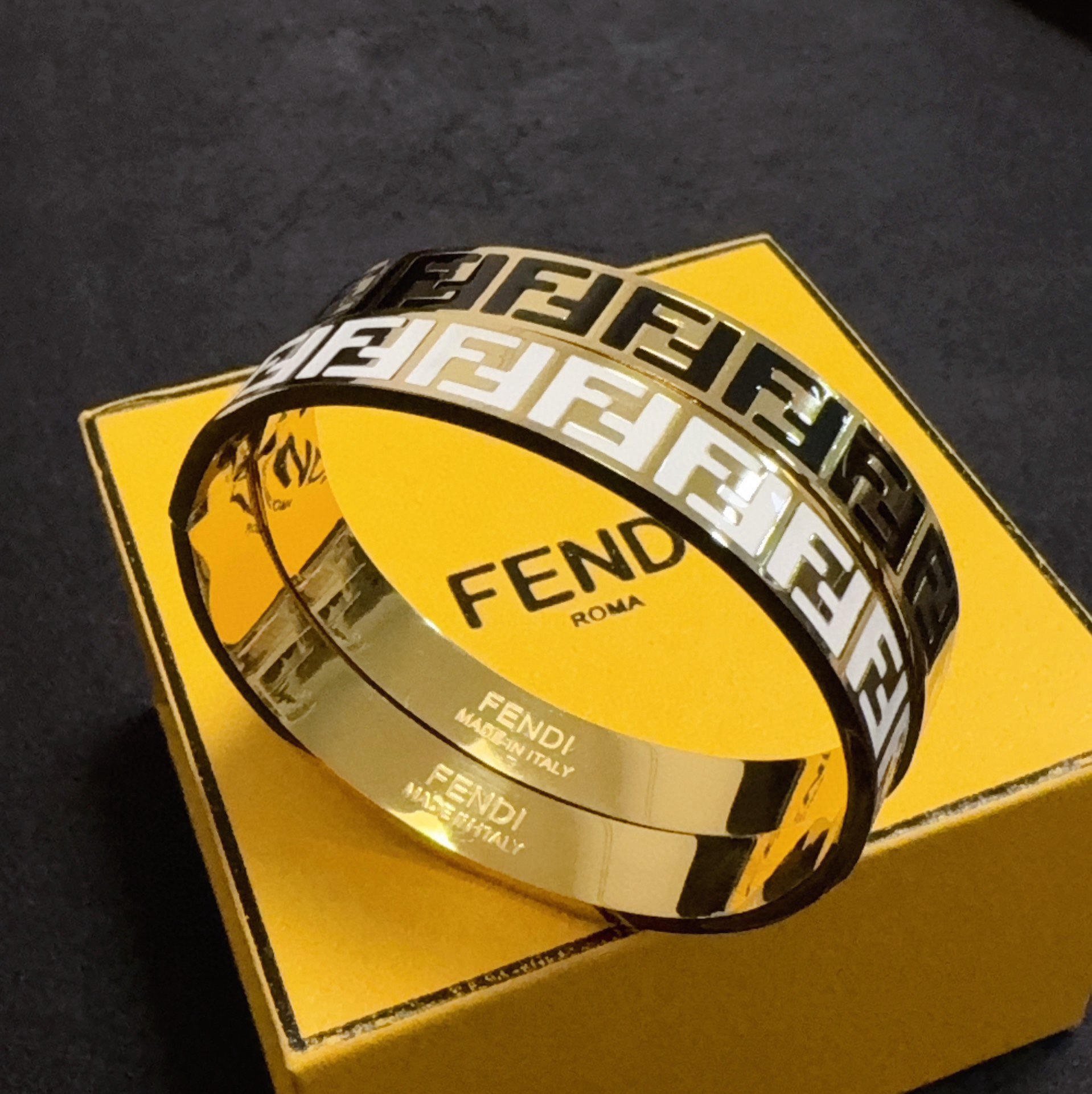 Fendi FF Logo Enamel Bangle bracelet gold-tone metal with black enamel FF monogram 17cm inner circumference