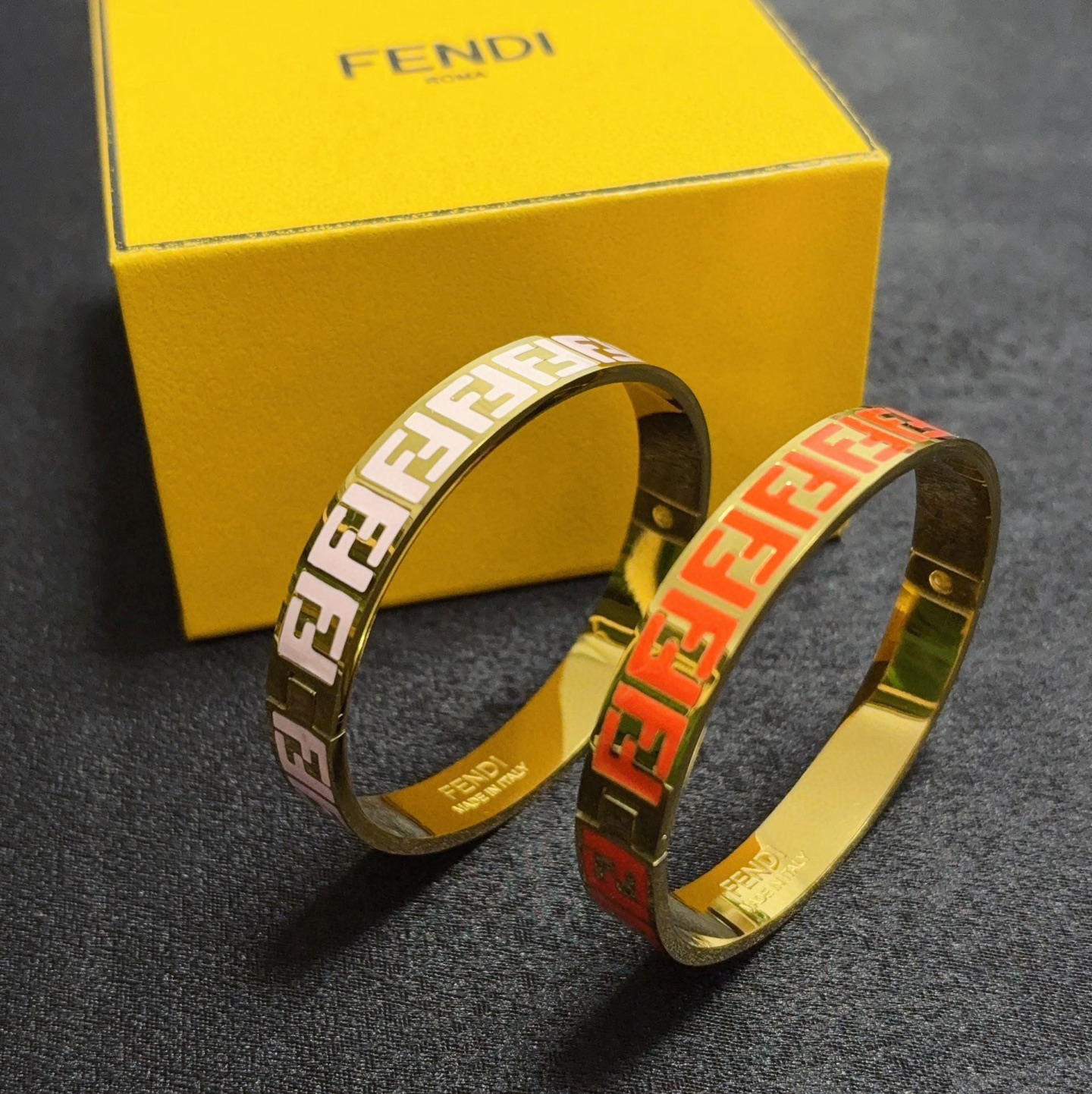 Fendi FF Logo Enamel Bangle bracelet gold-tone metal with black enamel FF monogram 17cm inner circumference