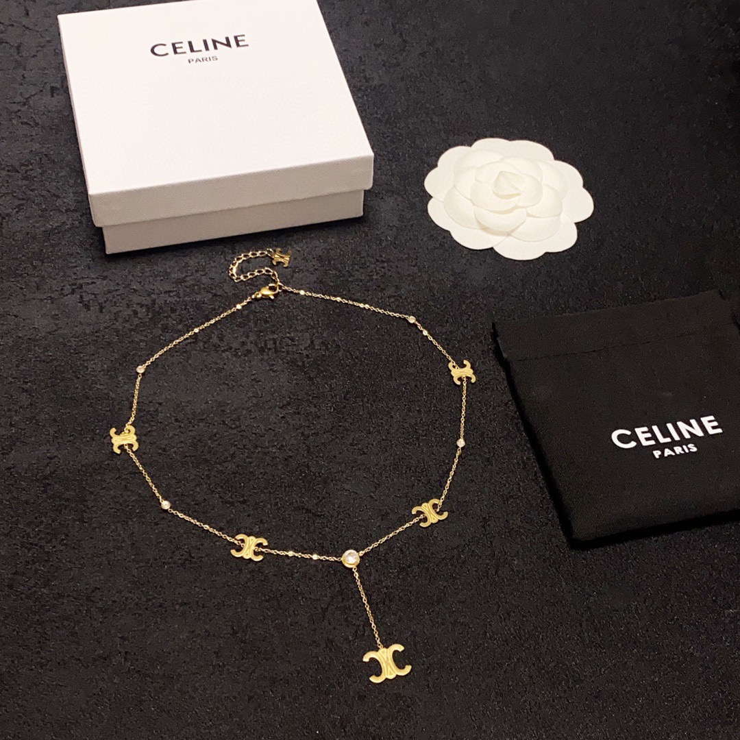 Celine Triomphe Multi-Logo Lariat necklace 14K gold-toned metal with clear cubic zirconia accents 45cm with 5cm extender