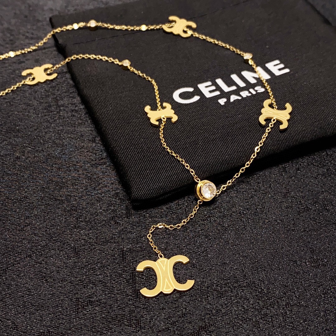 Celine Triomphe Multi-Logo Lariat necklace 14K gold-toned metal with clear cubic zirconia accents 45cm with 5cm extender