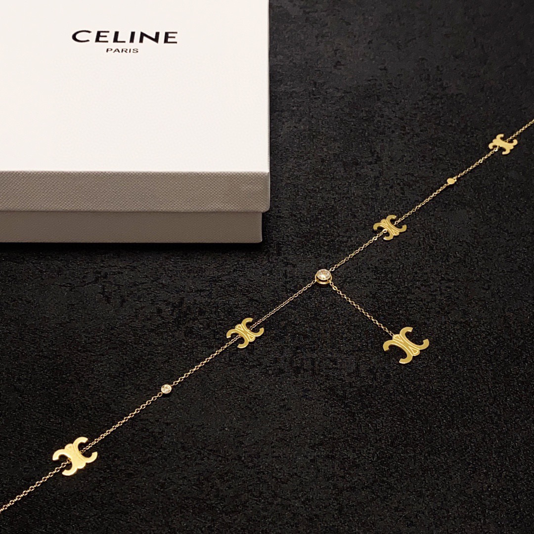 Celine Triomphe Multi-Logo Lariat necklace 14K gold-toned metal with clear cubic zirconia accents 45cm with 5cm extender