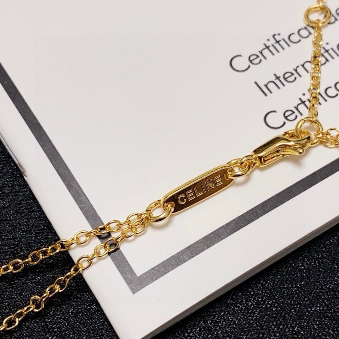Celine Triomphe Pearl Station Double Chain necklace gold-tone metal with white pearl accents 40cm with 5cm extender
