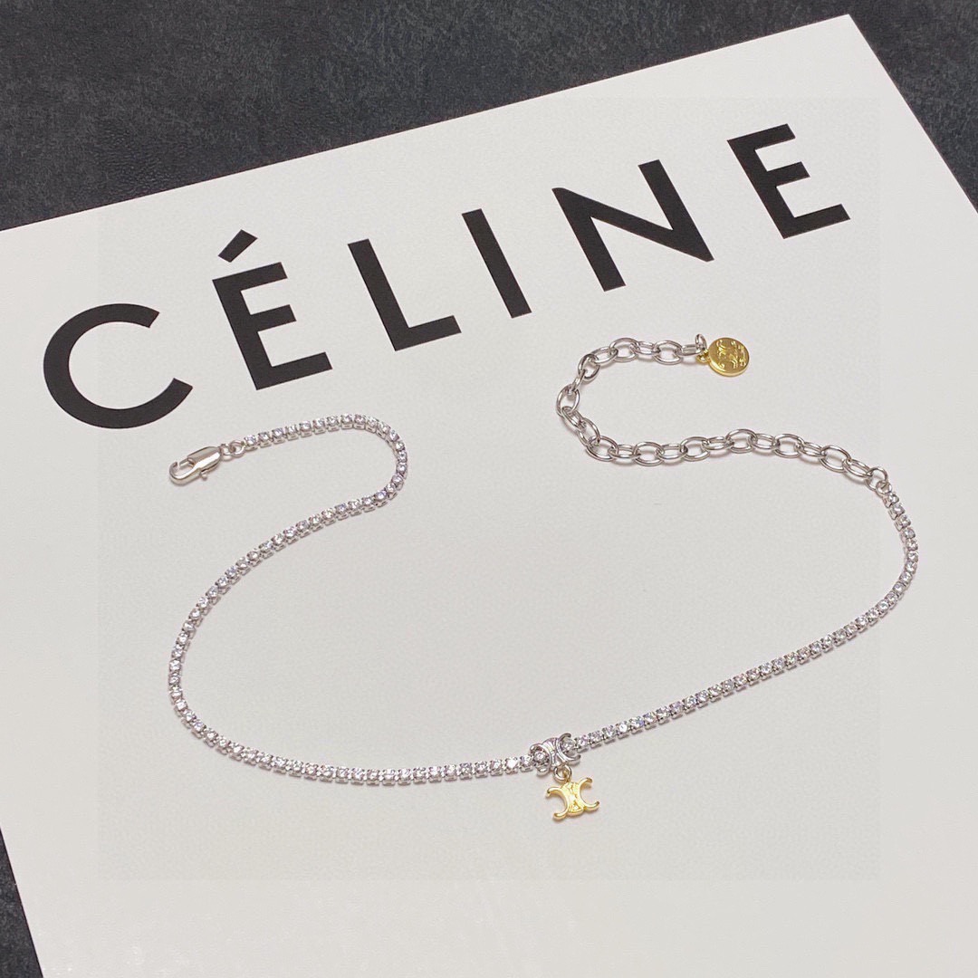 Celine Triomphe necklace silver-toned metal with clear cubic zirconia gold-toned Triomphe charm 38cm