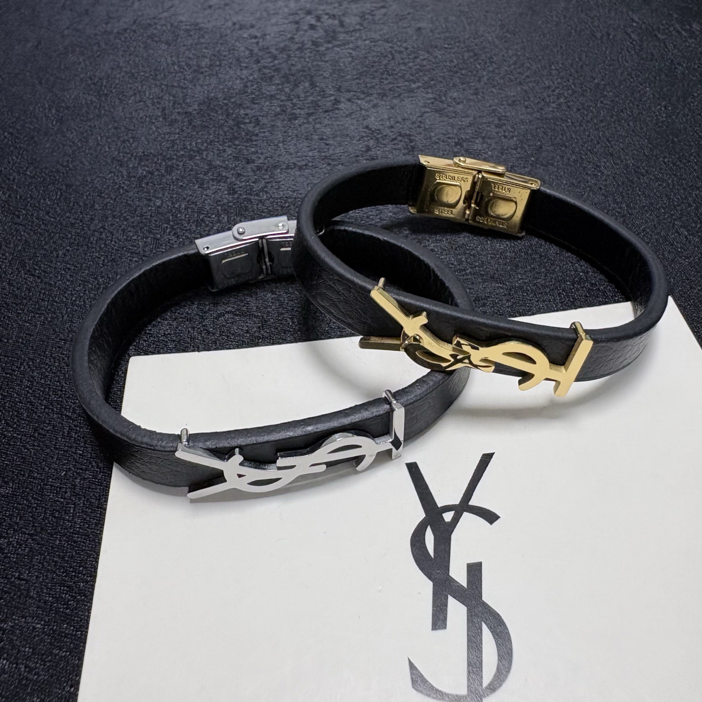 Saint Laurent Cassandre YSL Logo Leather Bracelet bracelet Black grained leather with gold-tone metal hardware 19cm