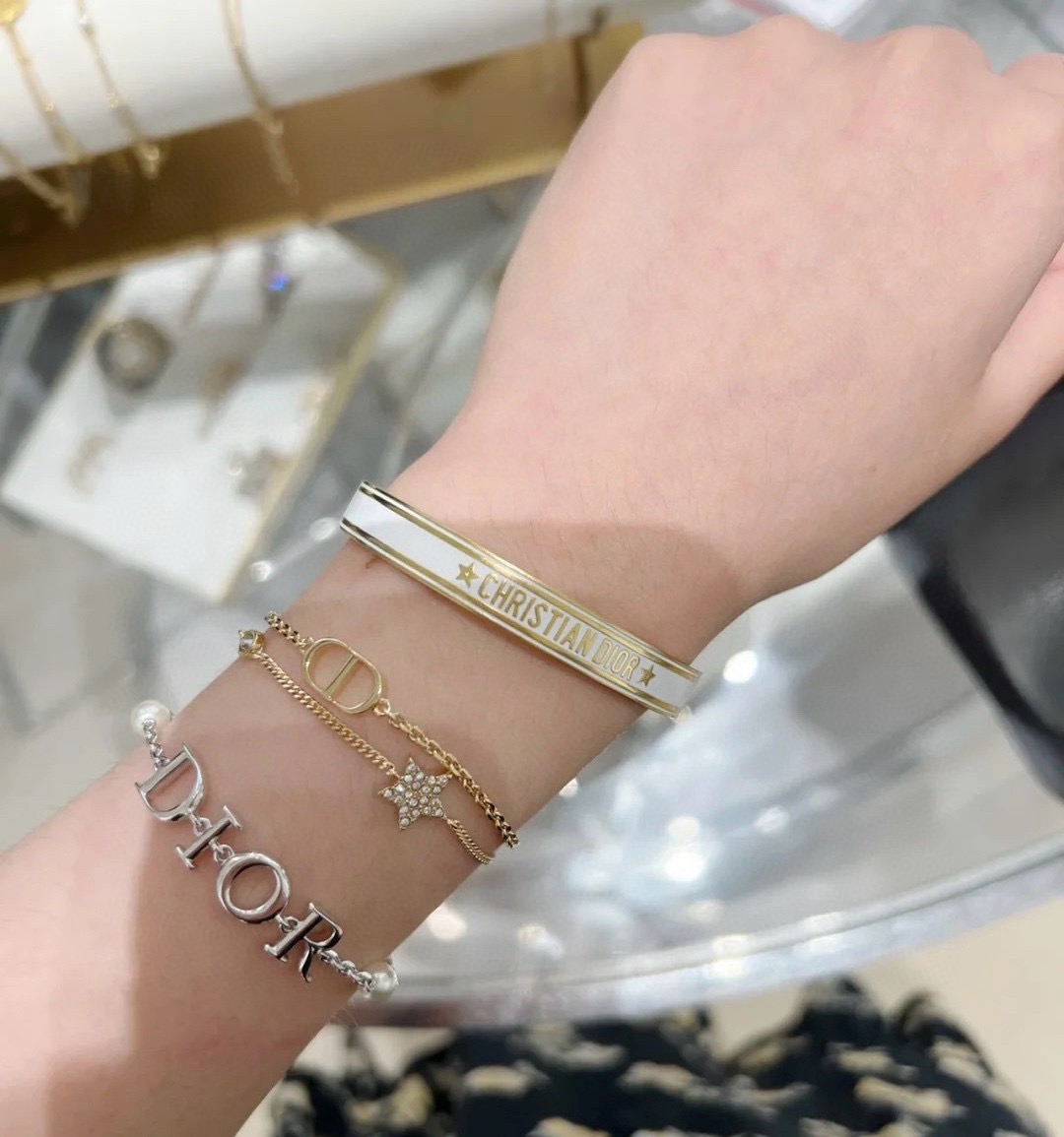 Dior Christian Dior Code Bangle bracelet Gold-tone metal with white black mint green and lilac enamel accents 6 5cm inner diameter