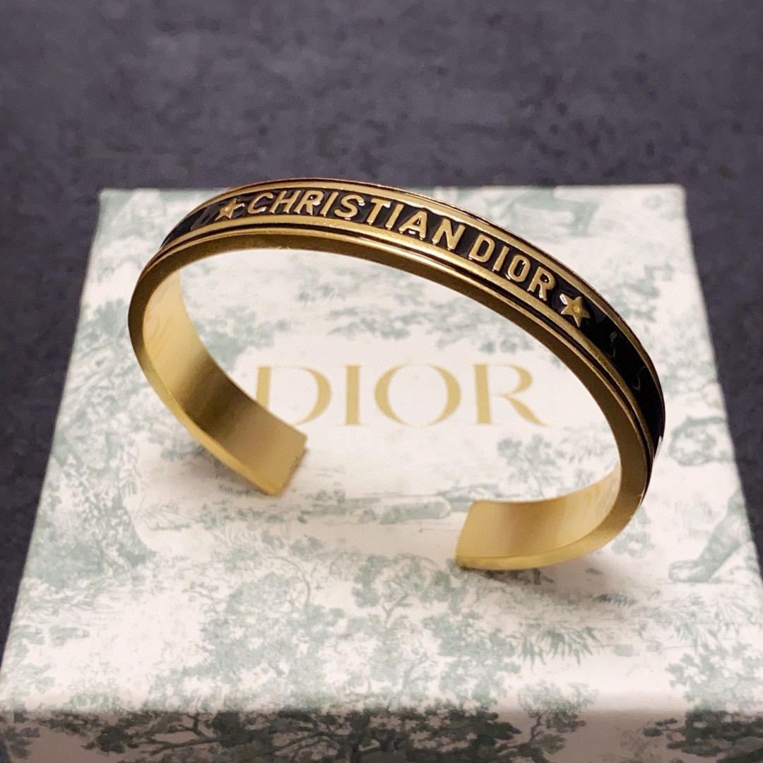 Dior Christian Dior Code Bangle bracelet Gold-tone metal with white black mint green and lilac enamel accents 6 5cm inner diameter