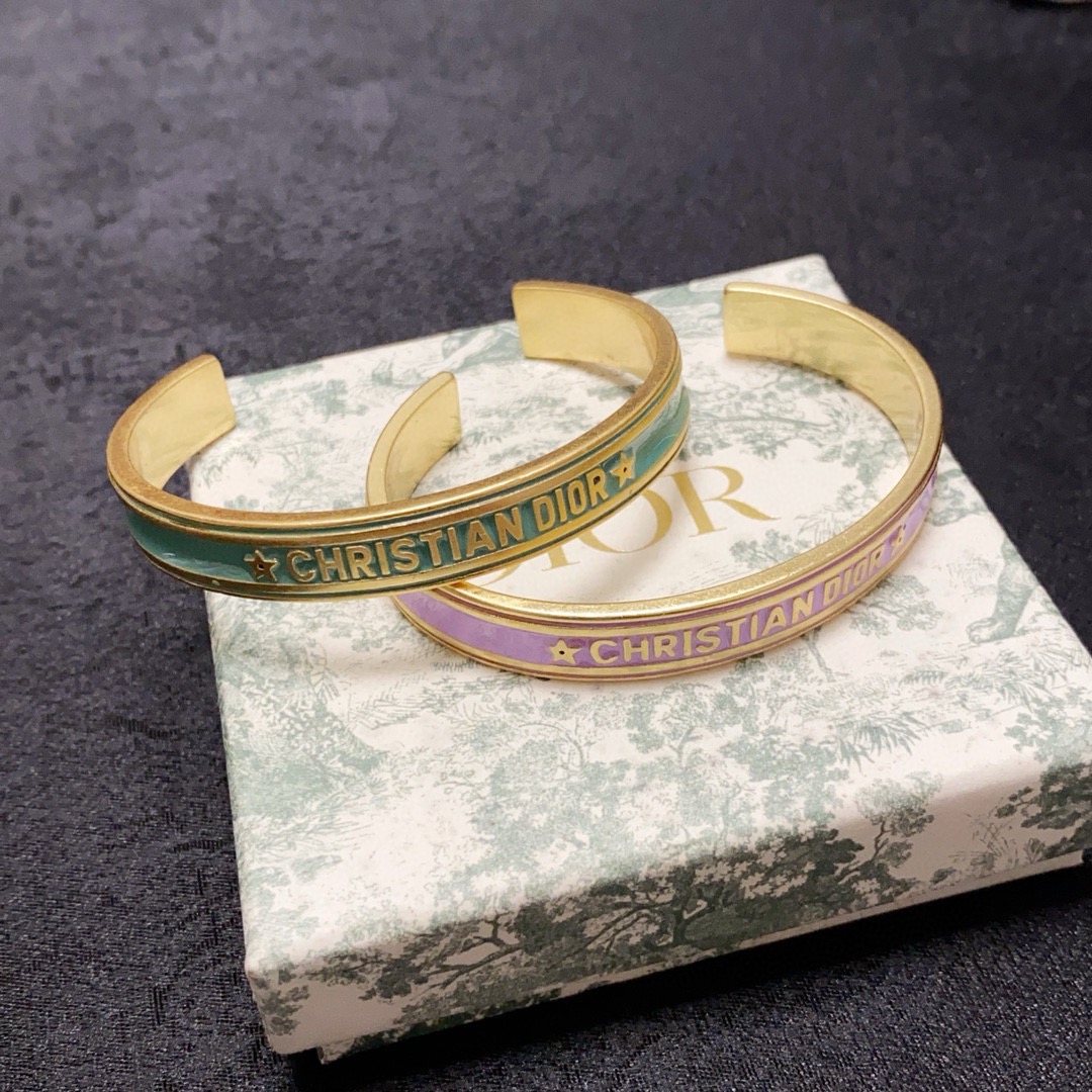 Dior Christian Dior Code Bangle bracelet Gold-tone metal with white black mint green and lilac enamel accents 6 5cm inner diameter