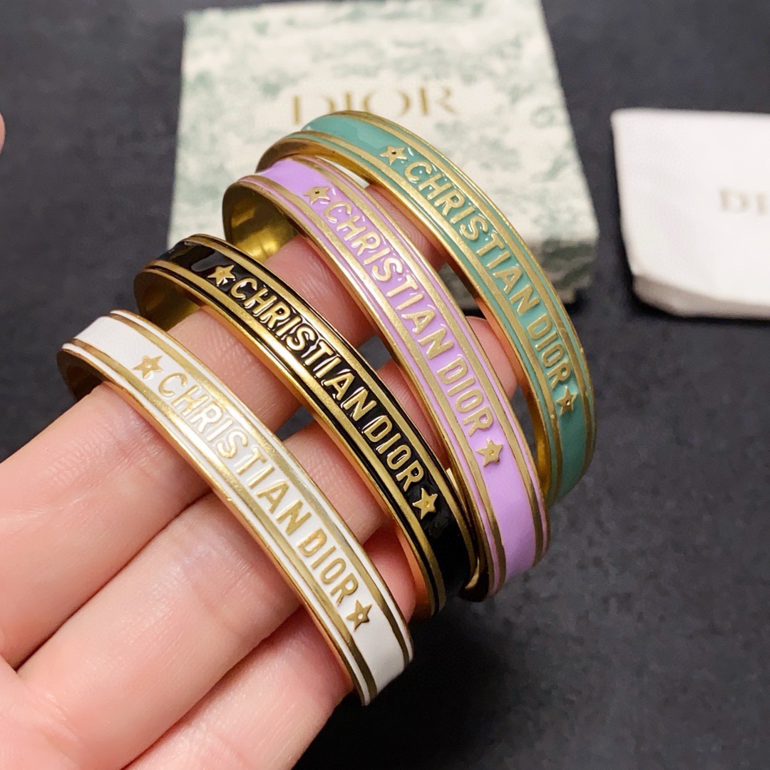 Dior Christian Dior Code Bangle bracelet Gold-tone metal with white black mint green and lilac enamel accents 6 5cm inner diameter