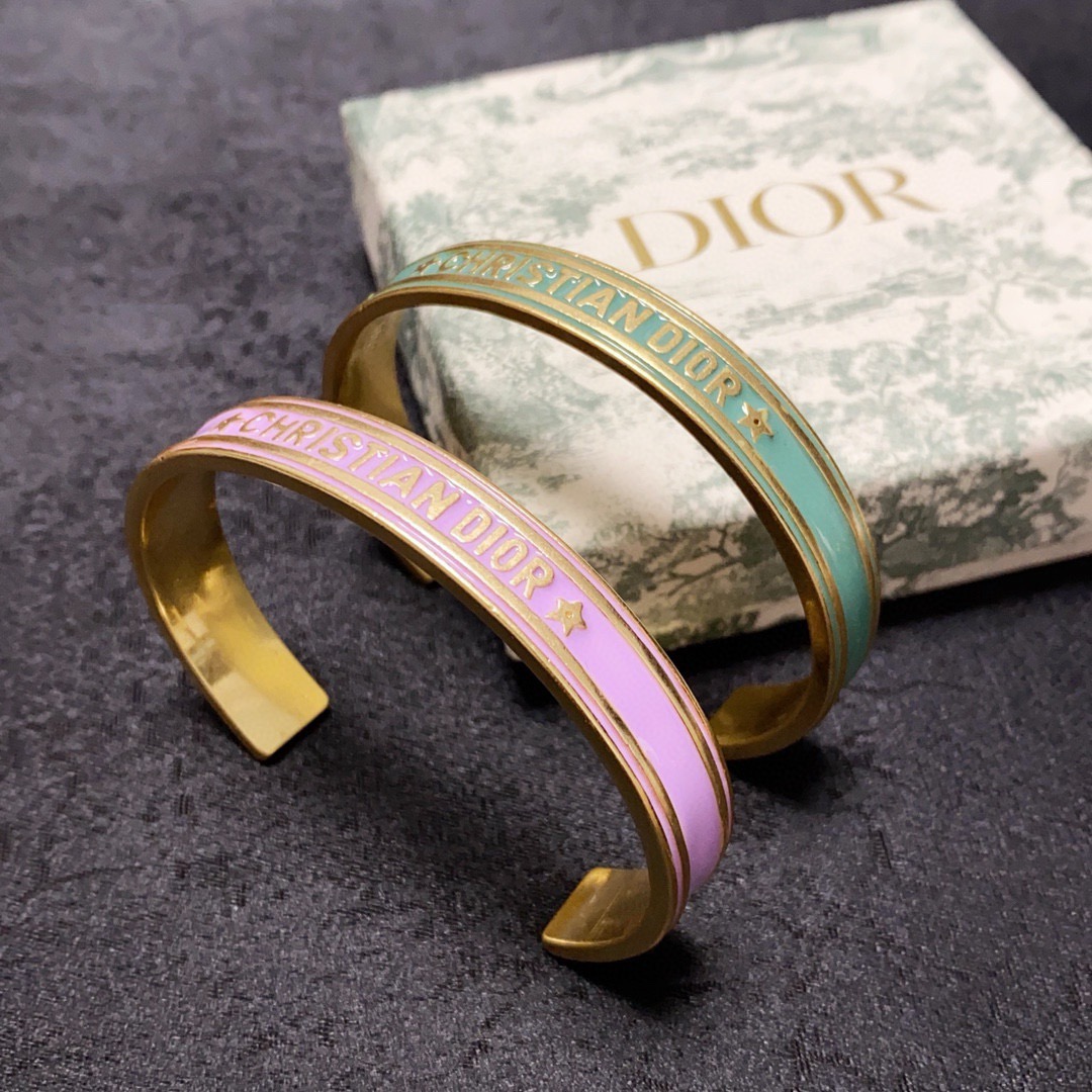 Dior Christian Dior Code Bangle bracelet Gold-tone metal with white black mint green and lilac enamel accents 6 5cm inner diameter