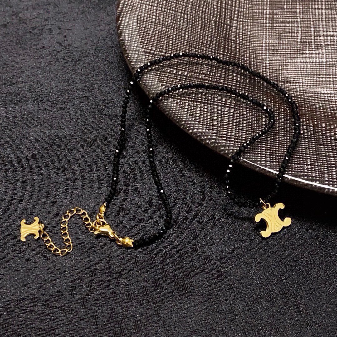 Celine Triomphe Skeleton Chic Beaded Necklace necklace Gold-tone metal with black faceted beads 16 inches choker length