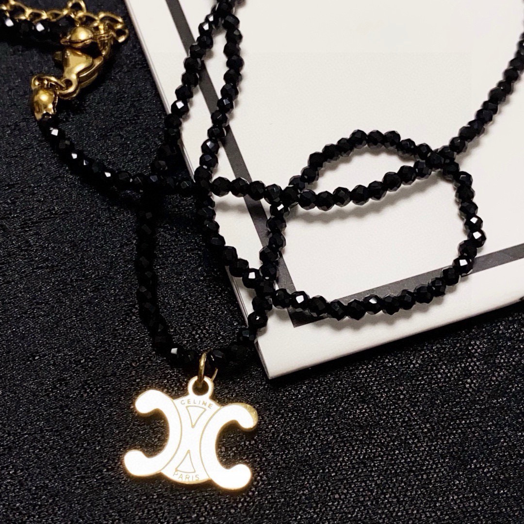 Celine Triomphe Skeleton Chic Beaded Necklace necklace Gold-tone metal with black faceted beads 16 inches choker length