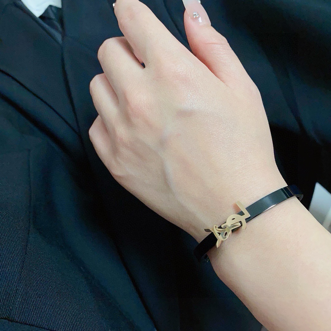 Saint Laurent Cassandre YSL Monogram Bangle bracelet black enamel band with gold-tone metal logo 17cm inner circumference