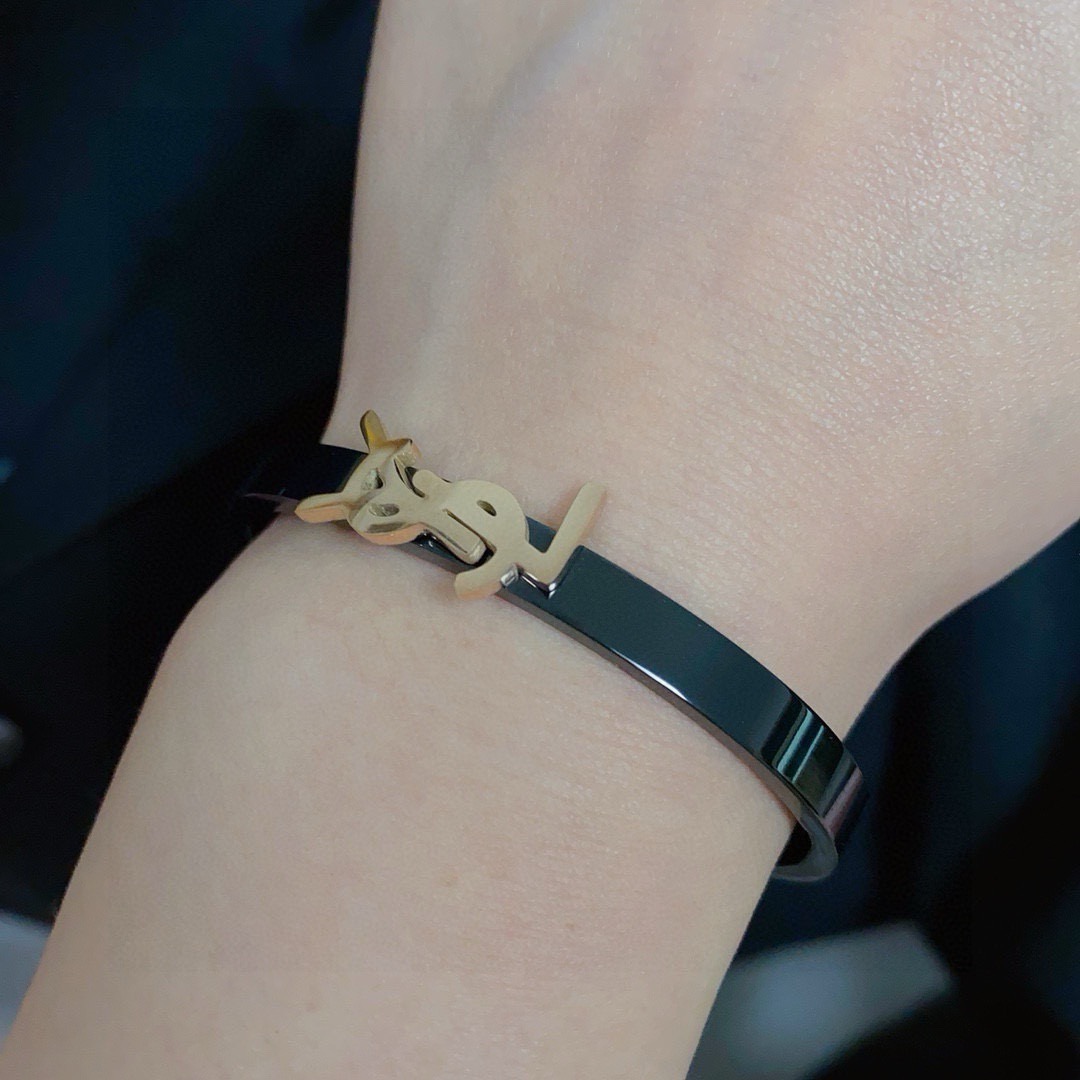 Saint Laurent Cassandre YSL Monogram Bangle bracelet black enamel band with gold-tone metal logo 17cm inner circumference