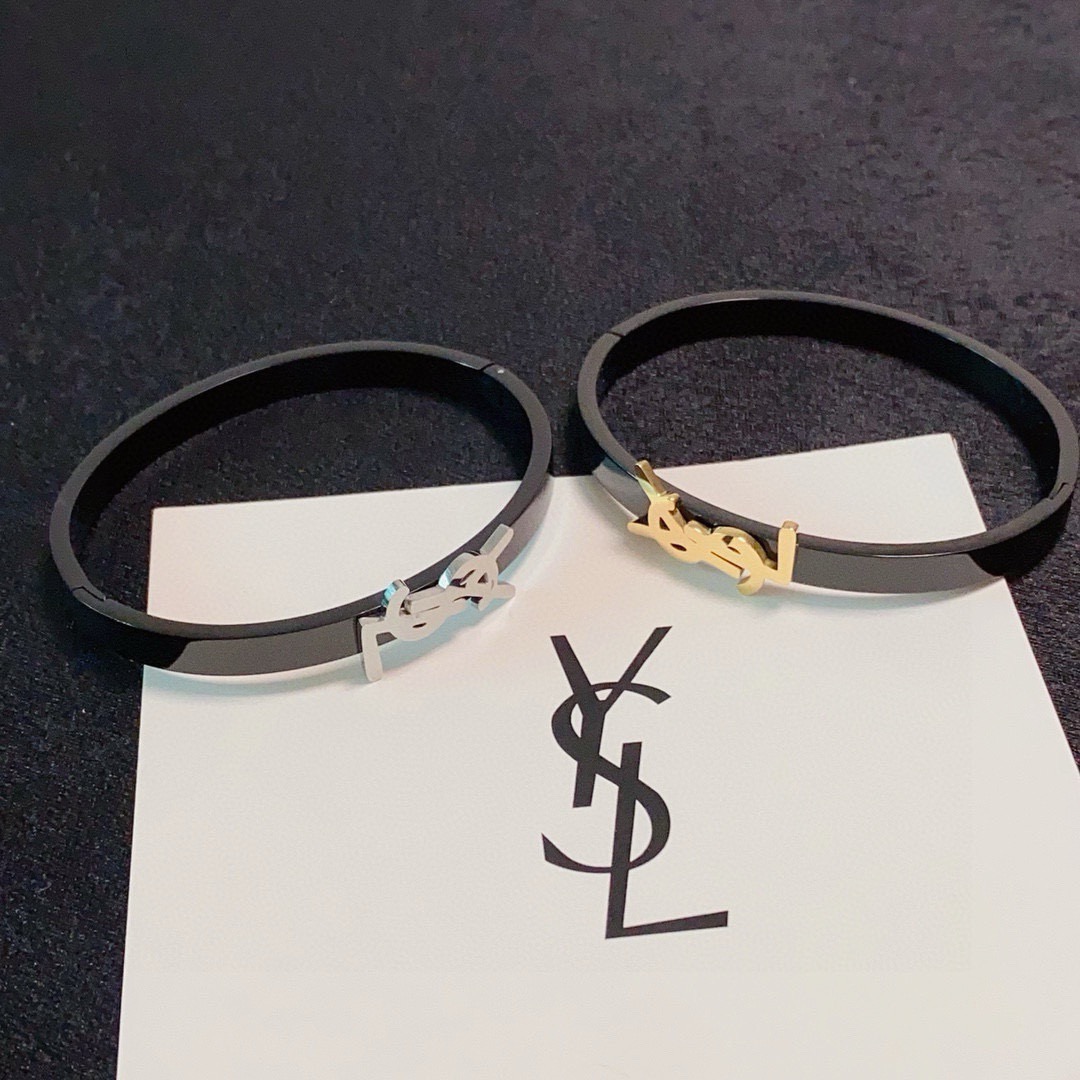 Saint Laurent Cassandre YSL Logo Bangle bracelet Black enamel metal with gold-tone or silver-tone YSL logo hardware 17cm inner circumference