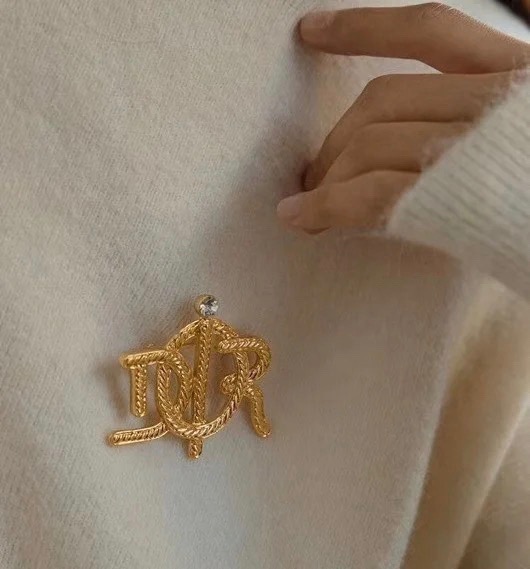 Dior D Series CD Logo Brooch brooch gold-tone metal with clear crystal accent 4cm width