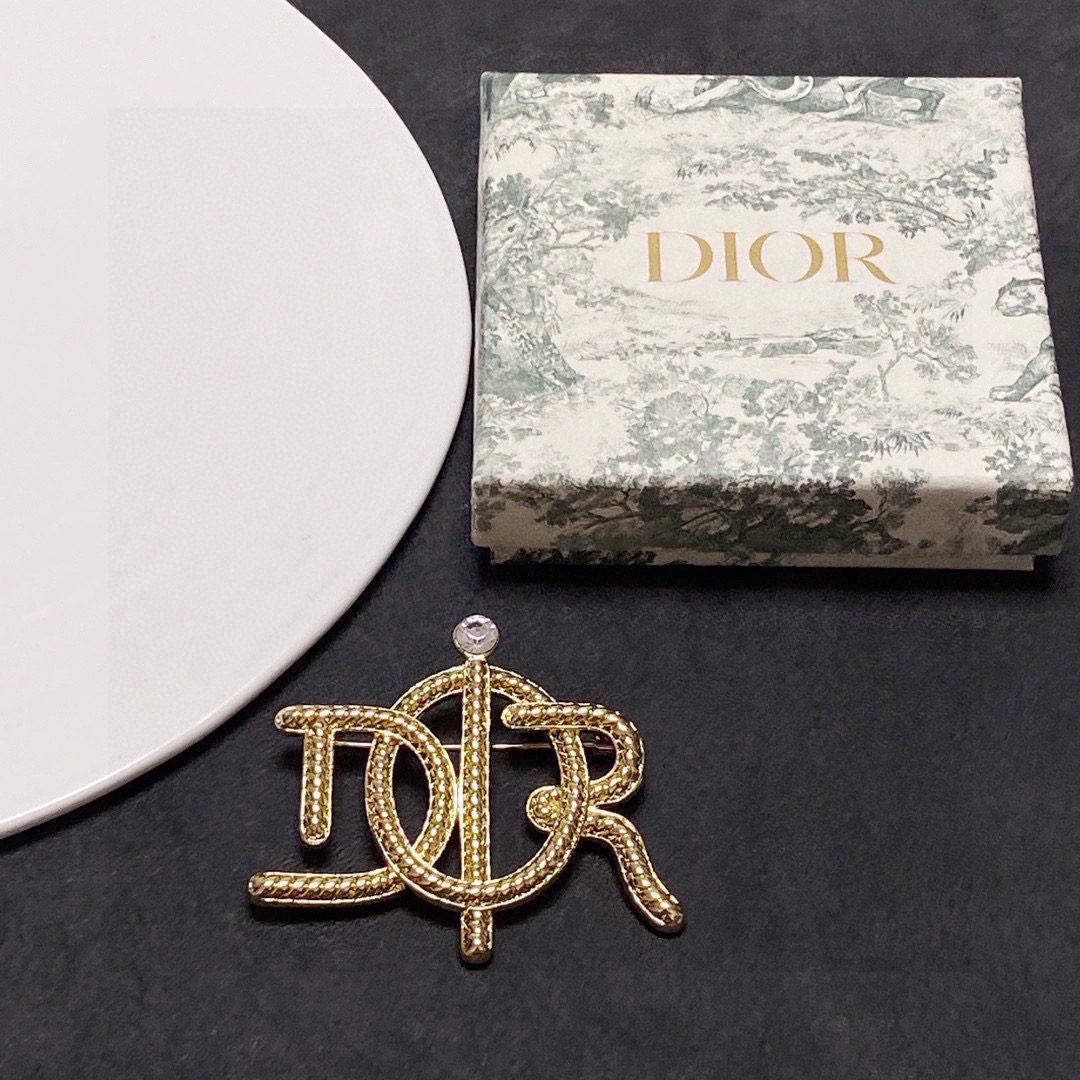 Dior D Series CD Logo Brooch brooch gold-tone metal with clear crystal accent 4cm width