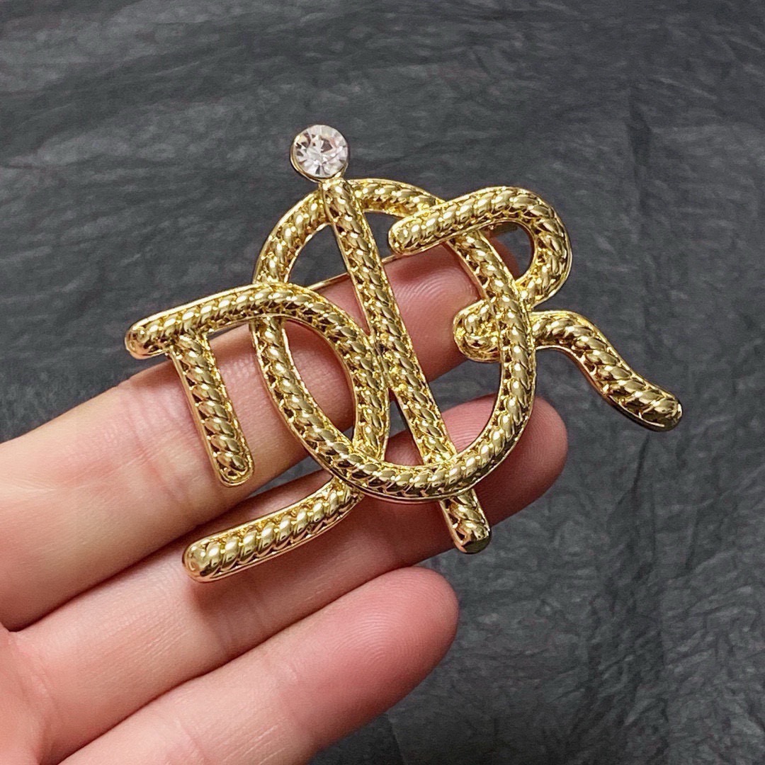 Dior D Series CD Logo Brooch brooch gold-tone metal with clear crystal accent 4cm width