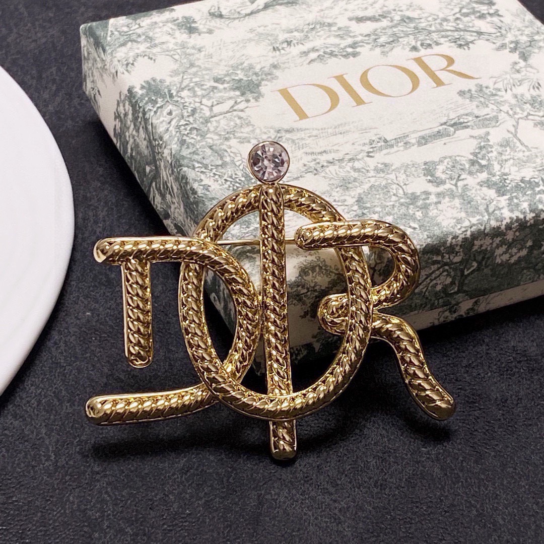 Dior D Series CD Logo Brooch brooch gold-tone metal with clear crystal accent 4cm width