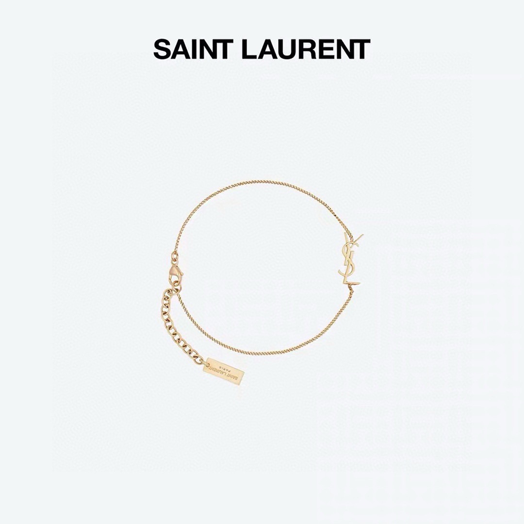Saint Laurent Cassandre YSL Logo bracelet gold-tone metal no gemstones 16cm with 3cm extender