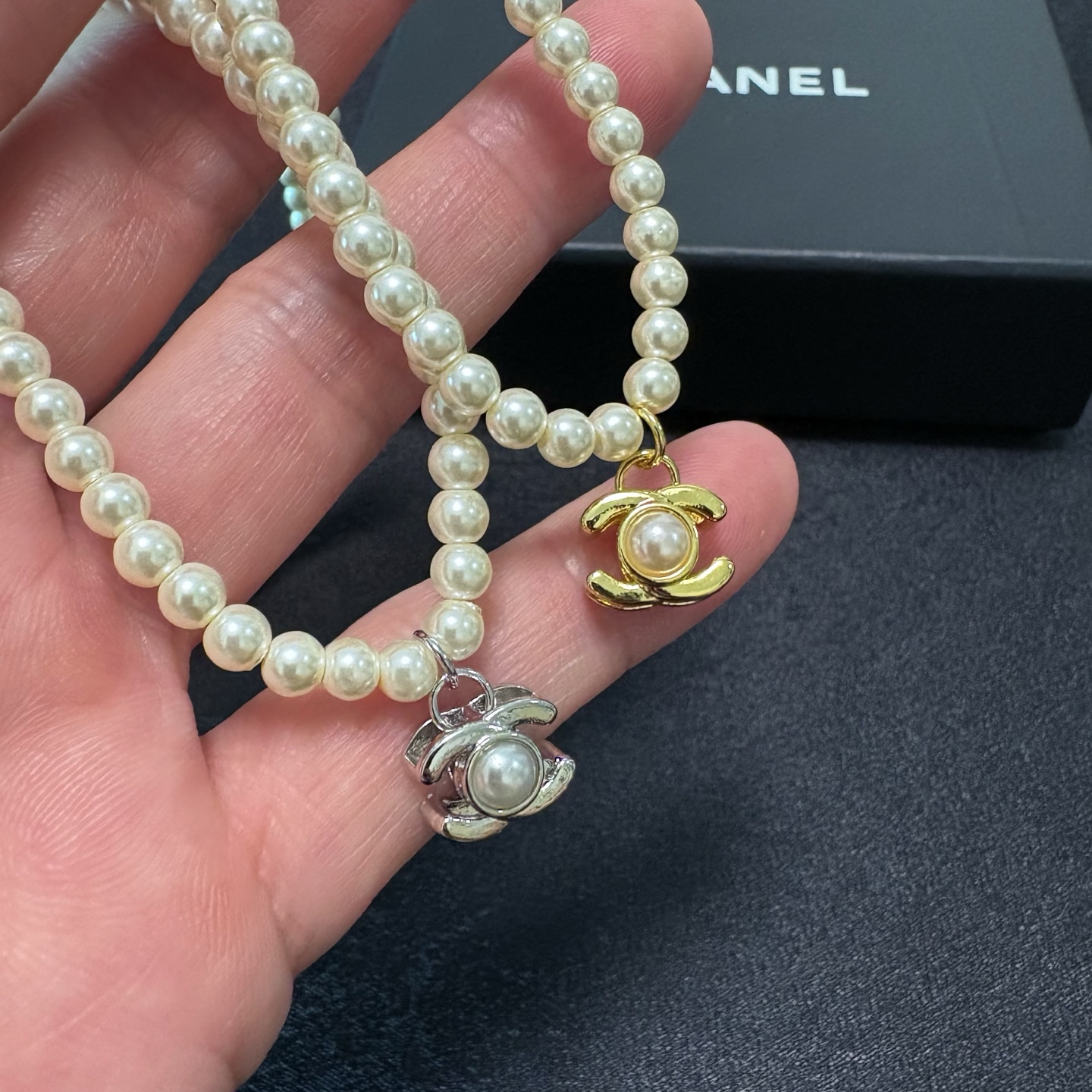 Chanel CC Turnlock Pearl Pendant necklace Gold-tone metal with white faux pearls 40cm