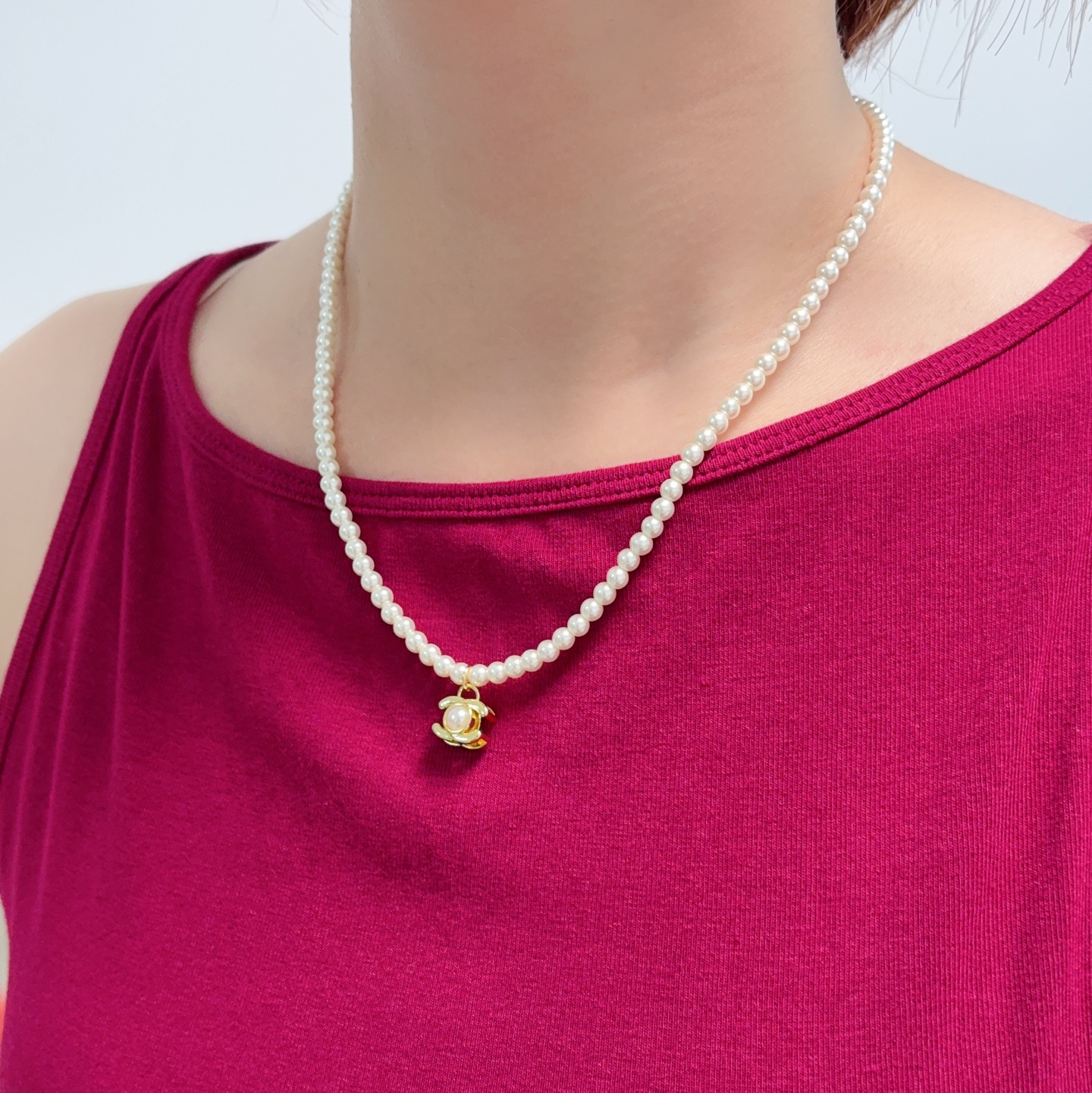 Chanel CC Turnlock Pearl Pendant necklace Gold-tone metal with white faux pearls 40cm