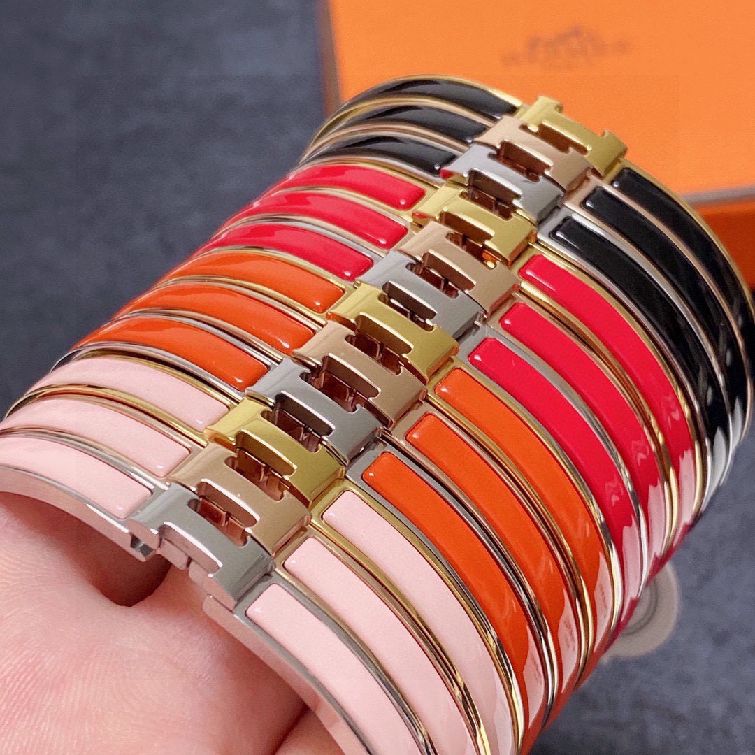Bracciale Hermes Clic H metallo oro rosa con smalto bianco MM