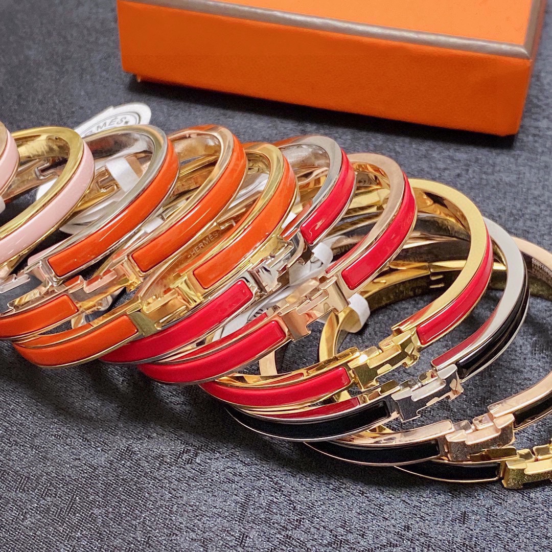 Bracciale Hermes Clic H metallo oro rosa con smalto bianco MM