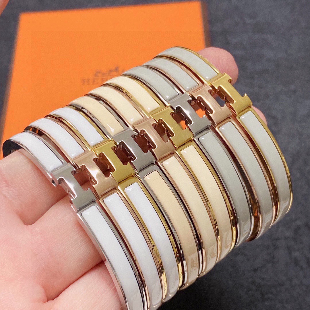 Bracciale Hermes Clic H metallo oro rosa con smalto bianco MM