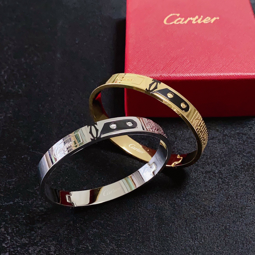 Cartier Love C de Cartier Decor Motif Bangle bracelet Multiple colorways silver-tone with black and red accents black with gold accents blue with gold accents rose gold-tone with black accents yellow gold-tone with black accents all with polished metal finishes and black enamel decorative details 21cm