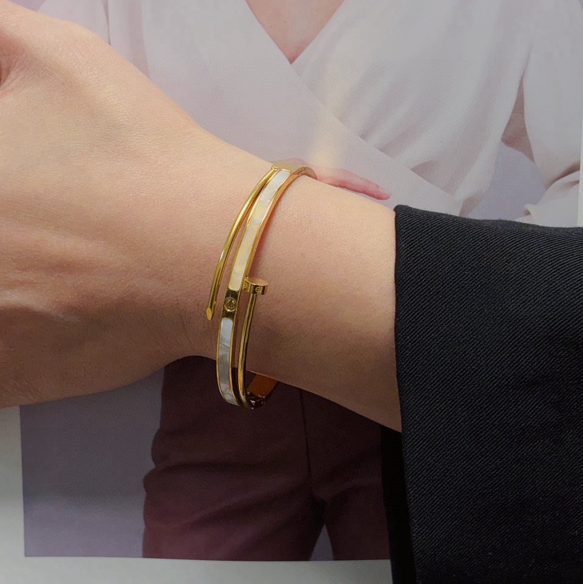 Cartier Juste un Clou bracelet 18k white gold 18k yellow gold white mother-of-pearl 17