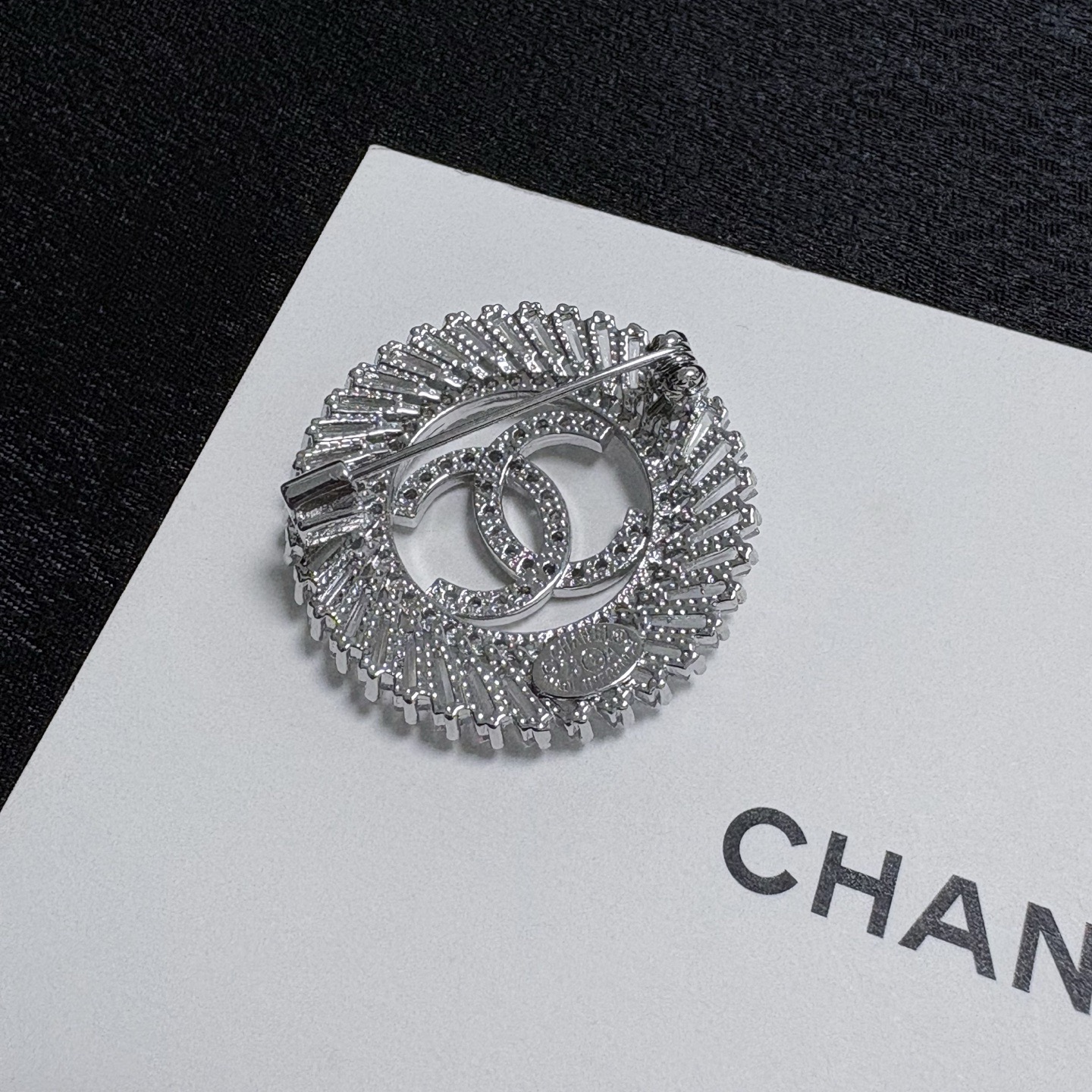 Chanel CC Logo Sunburst Crystal Brooch brooch silver-toned metal with clear crystal stones 3cm diameter