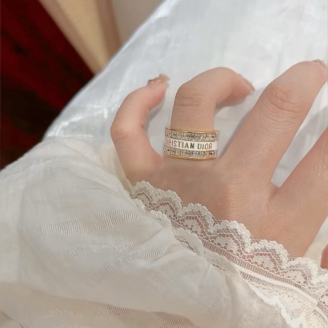 Dior Night Code ring gold-tone metal with clear crystals available with white enamel or black enamel logo band 6 7 8