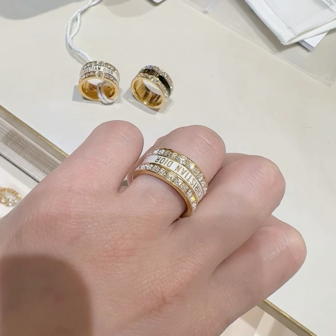 Dior Night Code ring gold-tone metal with clear crystals available with white enamel or black enamel logo band 6 7 8