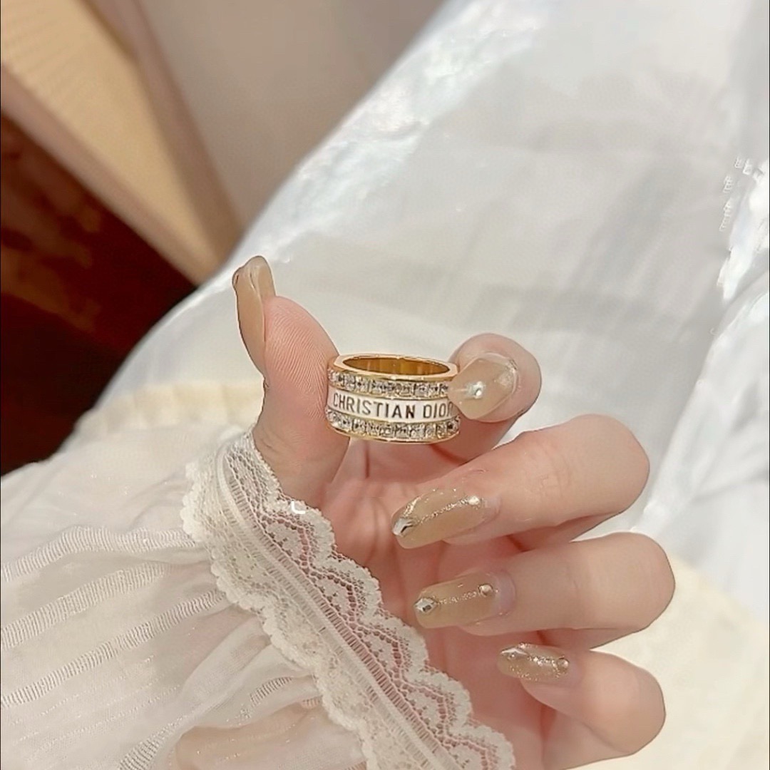 Dior Night Code ring gold-tone metal with clear crystals available with white enamel or black enamel logo band 6 7 8