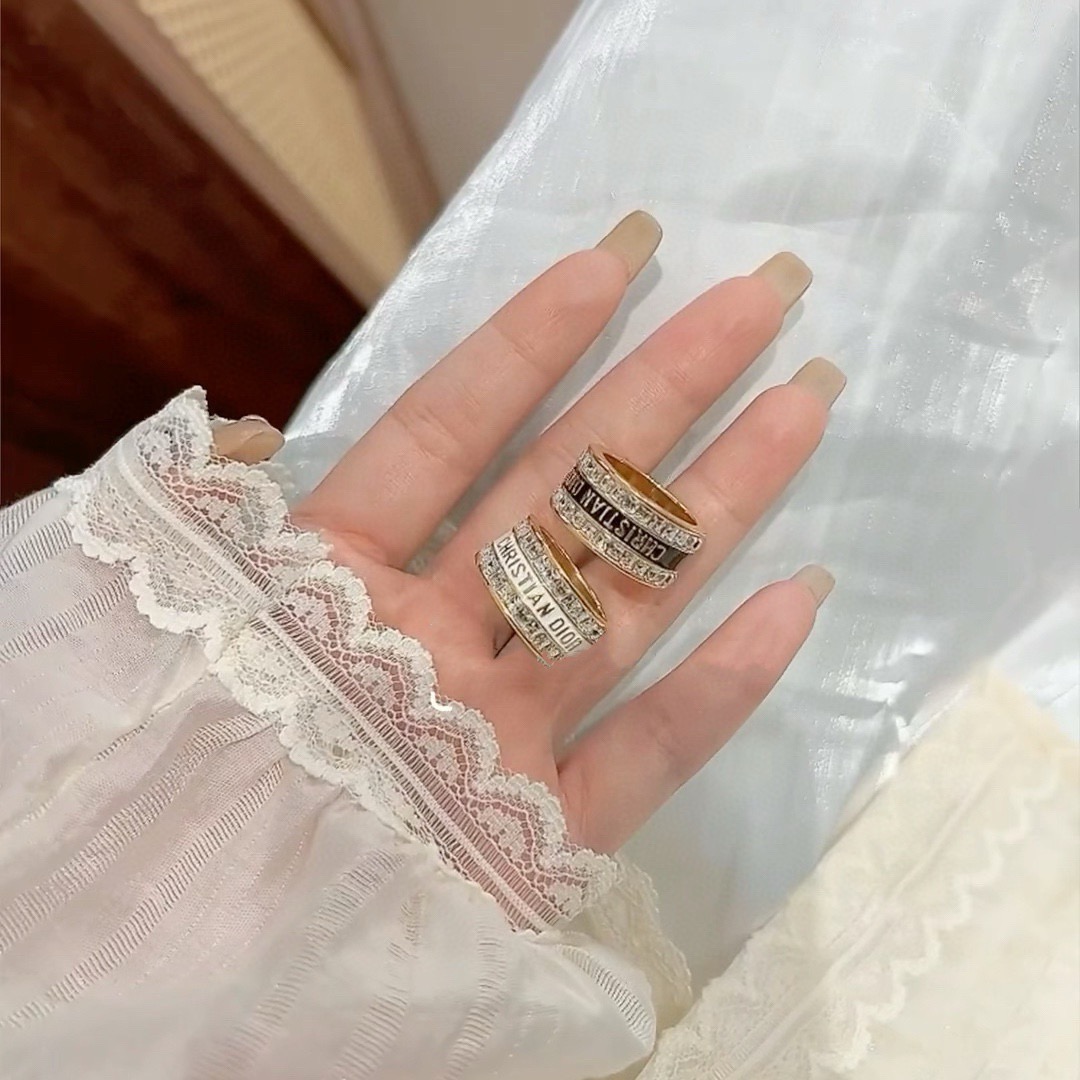 Dior Night Code ring gold-tone metal with clear crystals available with white enamel or black enamel logo band 6 7 8