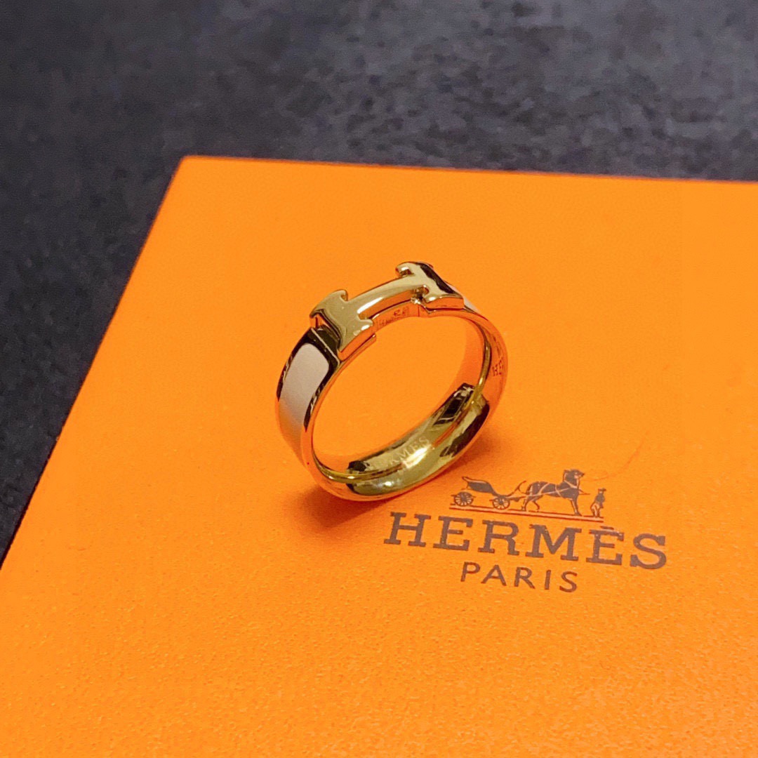 Anello Hermes Clic H in metallo dorato con smalto crema 7