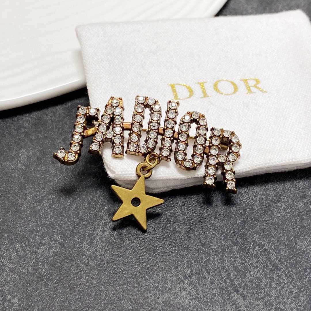Dior J Adior brooch antique gold tone metal with clear crystal accents and gold star charm 4cm width