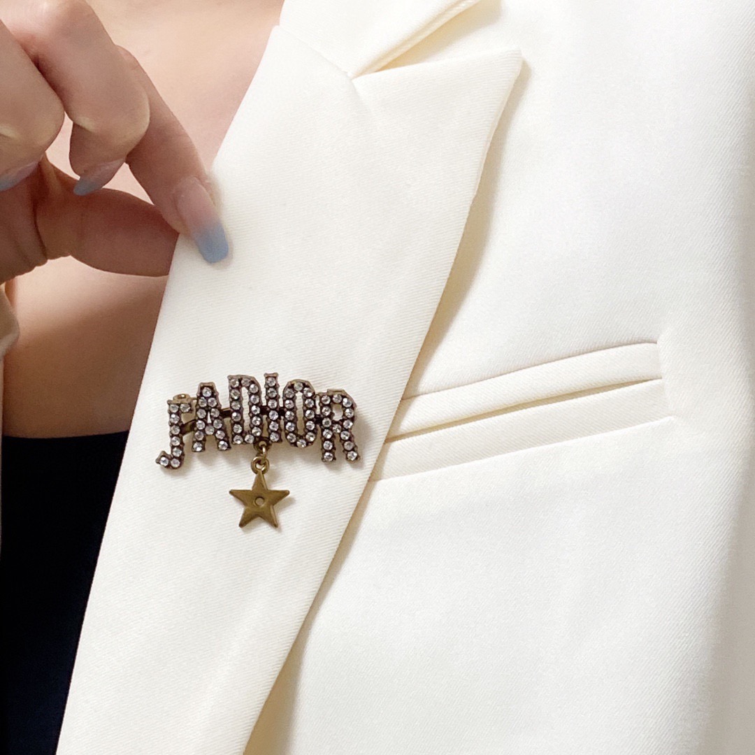Dior J Adior brooch antique gold tone metal with clear crystal accents and gold star charm 4cm width
